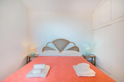 Letto o letti in una camera di Costa Rei - Belvedere panoramico - A/C