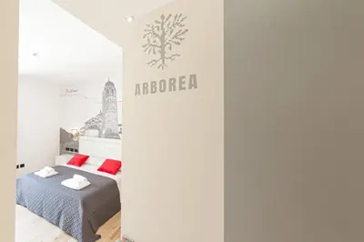 Letto o letti in una camera di Eleonore Elegant Rooms
