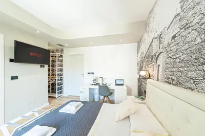TV o dispositivi per l'intrattenimento presso Eleonore Elegant Rooms