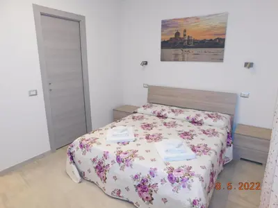 Letto o letti in una camera di B&B DiVino
