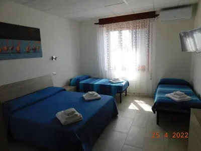 Letto o letti in una camera di B&B DiVino