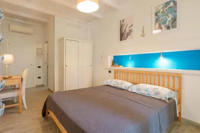 Letto o letti in una camera di Il Cagliarese B&B