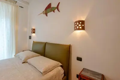 Letto o letti in una camera di Il Cagliarese B&B