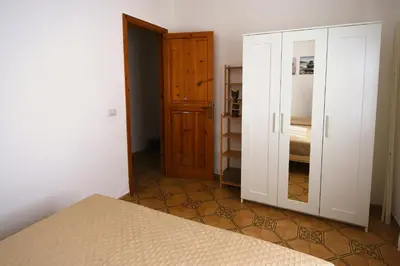 Letto o letti in una camera di Mario & Nina - Portopino House