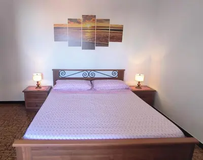 Letto o letti in una camera di La casa di Carlo