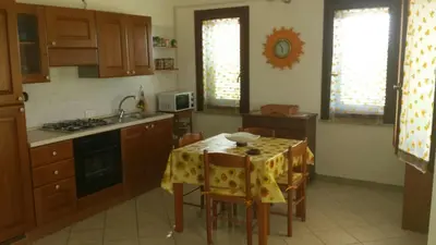 Cucina o angolo cottura di Casa Nanny Villetta panoramica Costa Rei