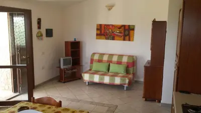 TV o dispositivi per l'intrattenimento presso Casa Nanny Villetta panoramica Costa Rei