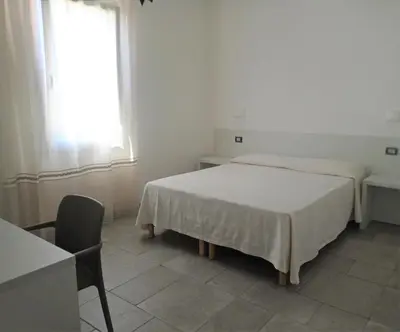 Letto o letti in una camera di B&B da Rosella