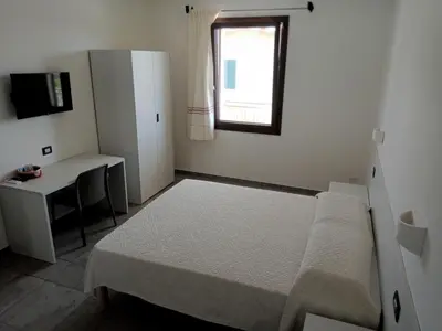 Letto o letti in una camera di B&B da Rosella