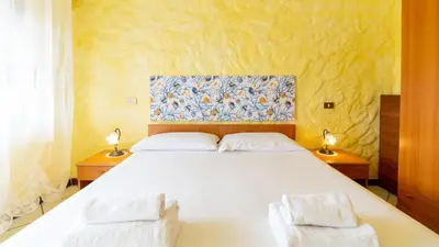 Letto o letti in una camera di La Ginestra