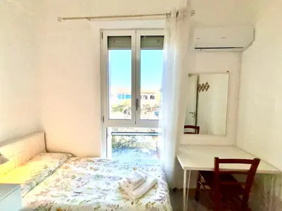 Letto o letti in una camera di Villa Poetto Beach by Home and Experience , Cagliari, Poetto