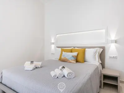 Letto o letti in una camera di Al Parco Studios - Studio Botticelli
