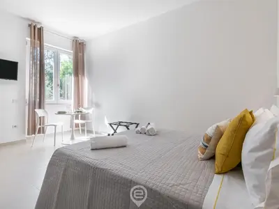 Letto o letti in una camera di Al Parco Studios - Studio Botticelli