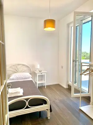 Letto o letti in una camera di VIlla Sunlight Sardegna
