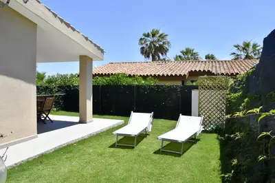 Giardino di Bilocale Mimosa 80 m dalla spiaggia
