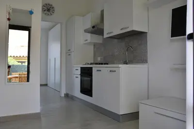 Cucina o angolo cottura di Bilocale Mimosa 80 m dalla spiaggia