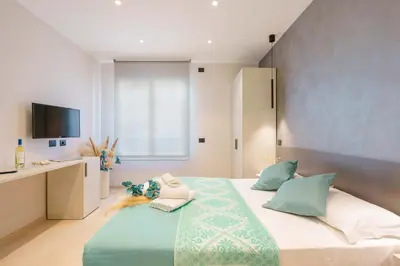 Letto o letti in una camera di Welcome Cagliari