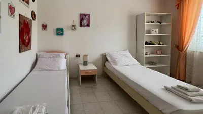 Letto o letti in una camera di Casa del Minatore 2 - Gonnesa