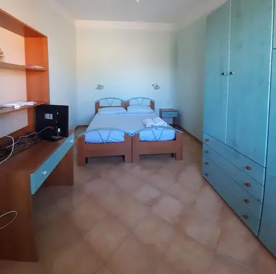 Letto o letti in una camera di Appartamento Angela