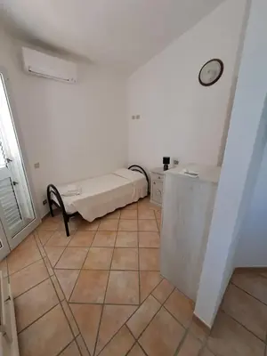 Letto o letti in una camera di ALICE B&B