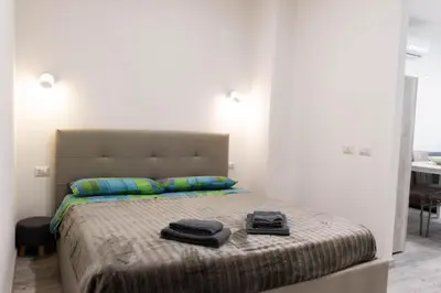 Letto o letti in una camera di CAUS Relax