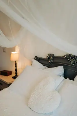 Letto o letti in una camera di Juniper Bay
