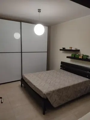 Letto o letti in una camera di Casa Stella
