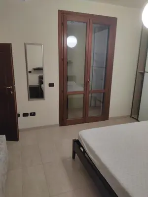 Letto o letti in una camera di Casa Stella