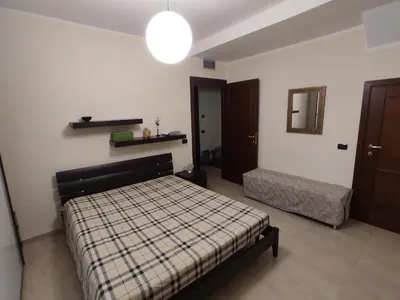 Letto o letti in una camera di Casa Stella