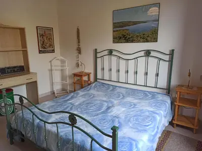 Letto o letti in una camera di Il giglio vista mare