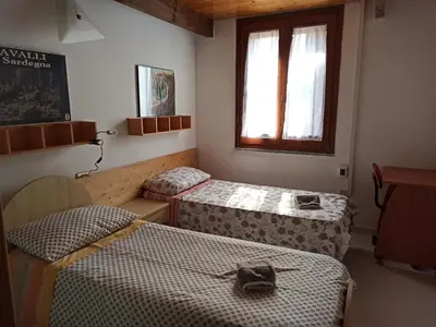 Letto o letti in una camera di Il giglio vista mare
