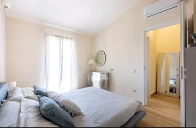 Letto o letti in una camera di Casa Aurora