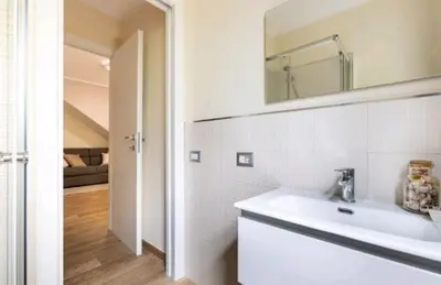 Letto o letti in una camera di Casa Aurora