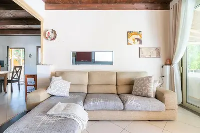 Area soggiorno di Villa ranch, piscina privata e parcheggio gratuito