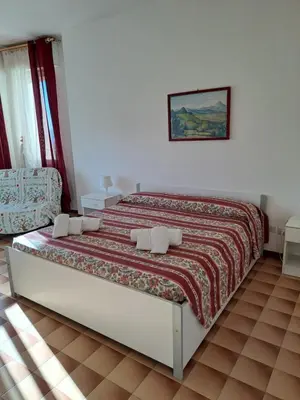 Letto o letti in una camera di Cala di Seta Apartment - Rubino