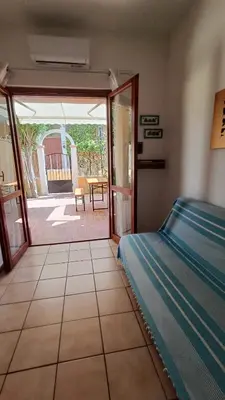 Letto o letti in una camera di Villasimius casa vacanze