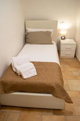 Letto o letti in una camera di Cann'e Sisa Luxury Villa Perla Marina A
