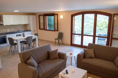 Area soggiorno di Cann'e Sisa Luxury Villa Perla Marina A