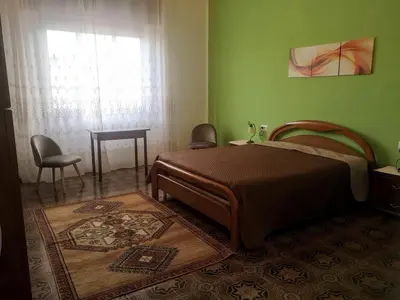 Letto o letti in una camera di L'oasi di Angela, CIN IT11163C2000Q5074