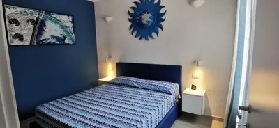 Letto o letti in una camera di Palm Rei House Costa Rei