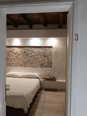 Letto o letti in una camera di AL183
