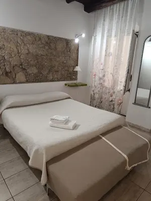 Letto o letti in una camera di AL183