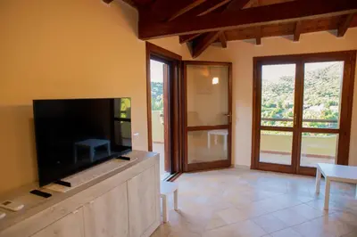 TV o dispositivi per l'intrattenimento presso Cann'e Sisa Luxury Villa Perla Marina B