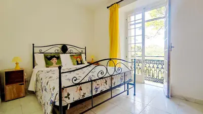 Letto o letti in una camera di AragoniteAzzurra Casa Vacanza