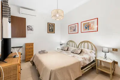 Letto o letti in una camera di Dimora del Chiostro