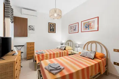 Letto o letti in una camera di Dimora del Chiostro