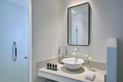 Bagno di Baia Di Chia Resort Sardinia, Curio Collection By Hilton