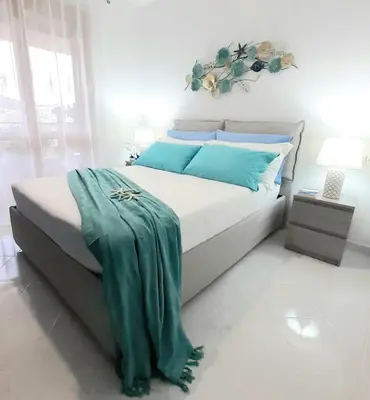 Letto o letti in una camera di Un angolo di paradiso