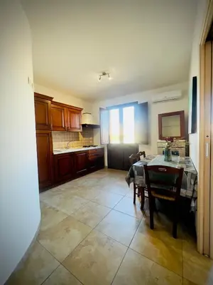 Cucina o angolo cottura di WEST SARDINIA APARTMENT 3