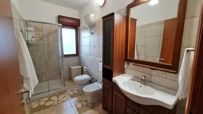 Bagno di Villa Vivi. Piscina, idro, giardino e condizionatore